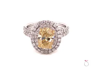 Natural Fancy Yellow Oval Diamond Halo Ring, 18K White Gold 2.34 CTW